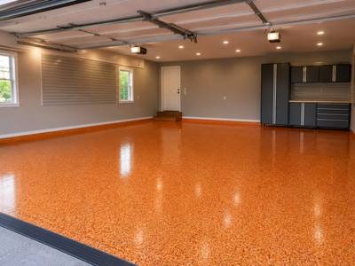 Orange flake floor in a double garage with the doors up